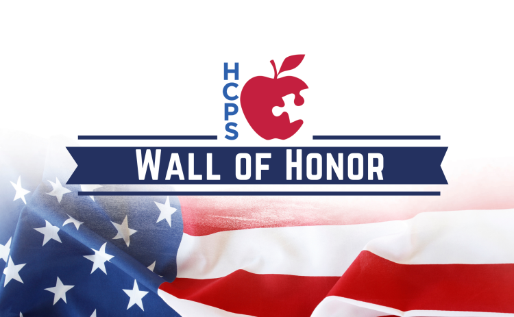 An image of text that says "HCPS Wall of Honor." The background image is the American flag.